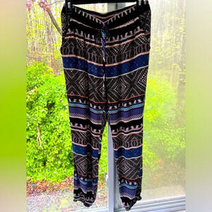 BeBop L Multi Colored Leggings that gathers at the ankle. Side slant pockets adj